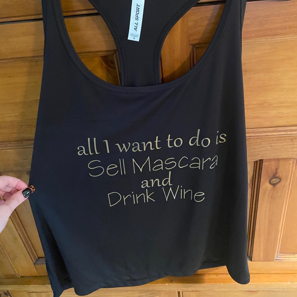 NWOT.  Black racer back tank. Size M.  $12